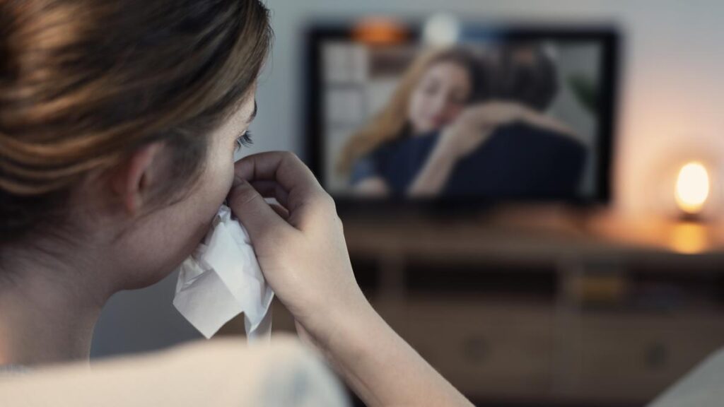 Woman-crying-while-watching-tv-in-the night-marketing-strategies